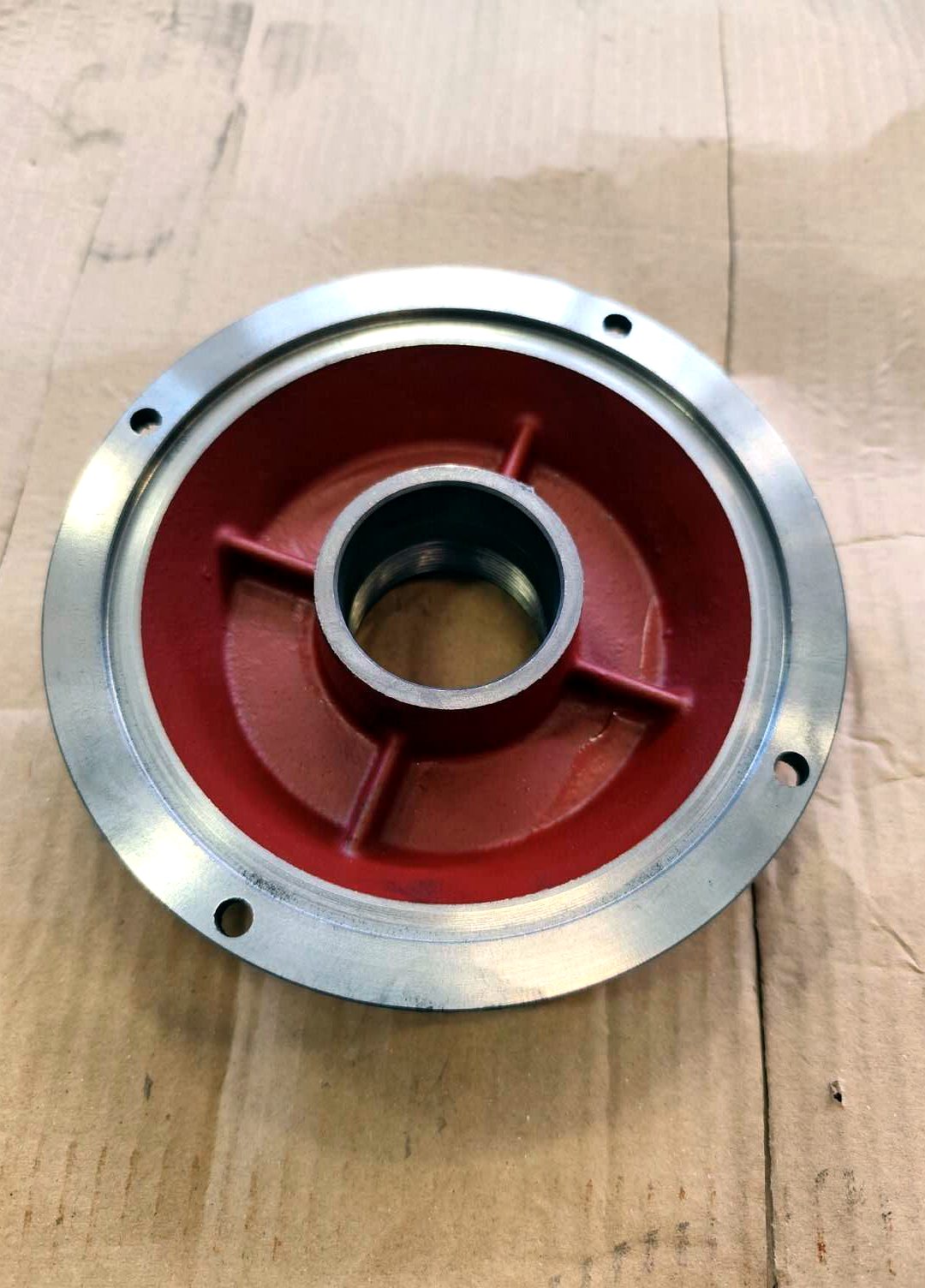 Fully machined cast bearing cap — bore, face and threads finished to drawing tolerance